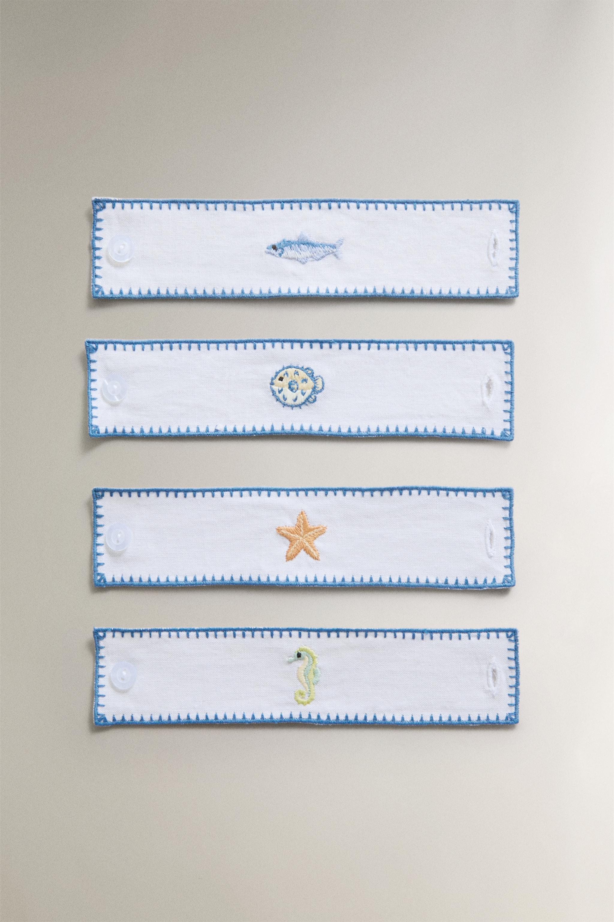 LOT DE 4 RONDS DE SERVIETTE EN RAMIE